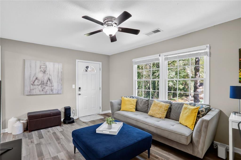 2019 Grant Road Southwest Atlanta, GA 30331 - Photo 5 of 17 a living room with furniture and a large window