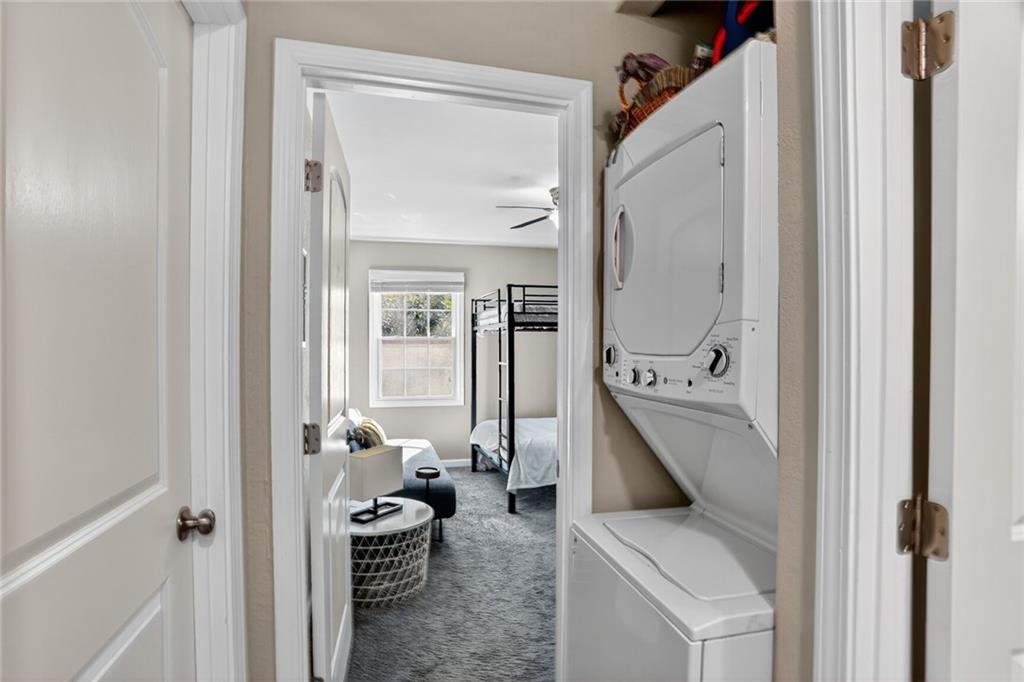 2019 Grant Road Southwest Atlanta, GA 30331 - Photo 8 of 17 a en suite bathroom with a granite countertop tub shower and a sink