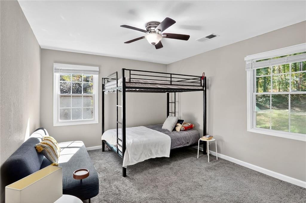 2019 Grant Road Southwest Atlanta, GA 30331 - Photo 9 of 17 a bedroom with bed and a window