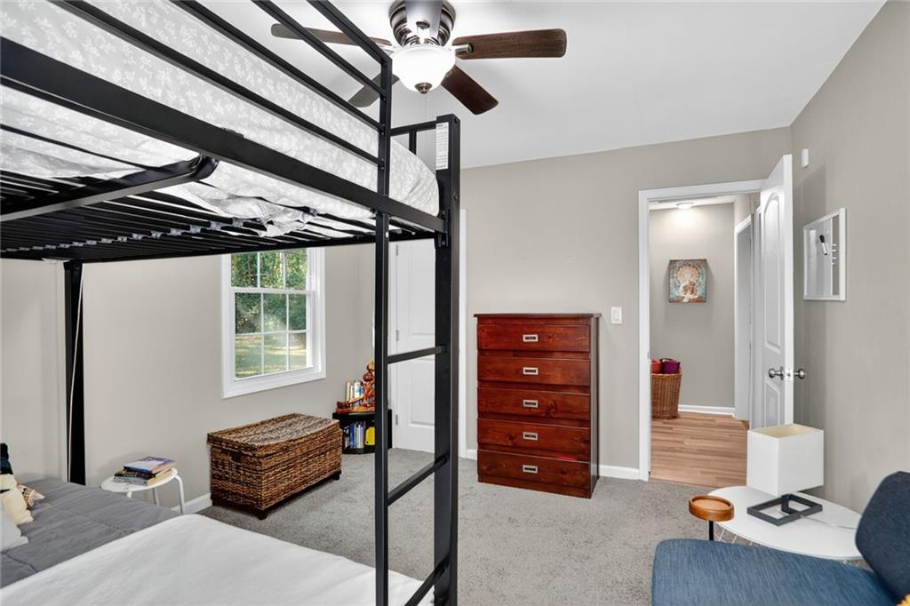 2019 Grant Road Southwest Atlanta, GA 30331 - Photo 10 of 17 a bedroom with furniture and a window