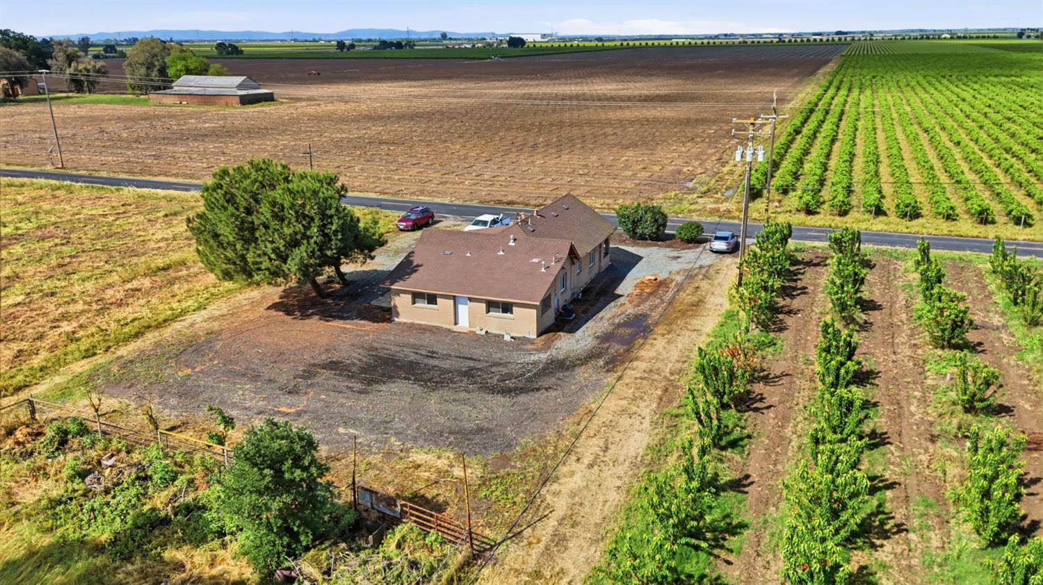 20042 North Ray Road Lodi, CA 95242 - Photo 39 of 63 an aerial view of a house with lake view