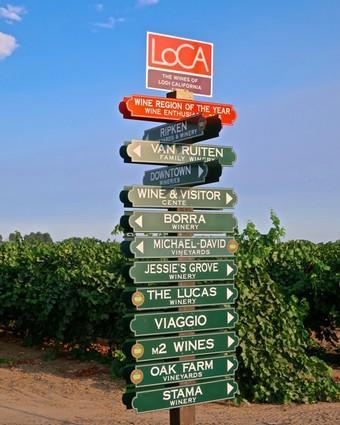20042 North Ray Road Lodi, CA 95242 - Photo 61 of 63 a sign on the side of a road