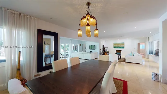 a kitchen with stainless steel appliances granite countertop a sink and a stove