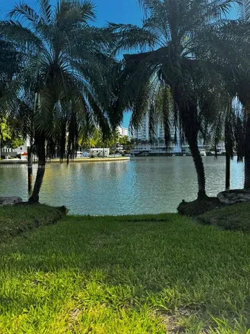 a view of a livingroom with furniture and window