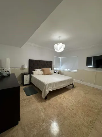 a bathroom with a sink a toilet and tub