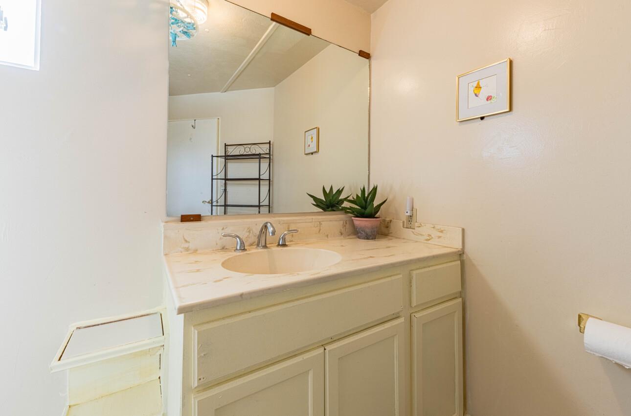 55 San Juan Grade Road, Unit 79 Salinas, CA 93906 - Photo 16 of 22 a bathroom with a sink and a mirror