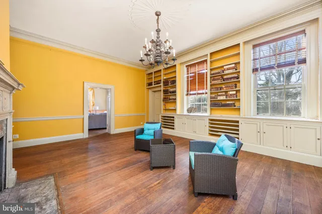 a bathroom with a sink toilet and a mirror