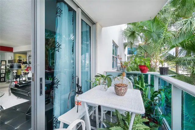 a view of gallery with wooden floor