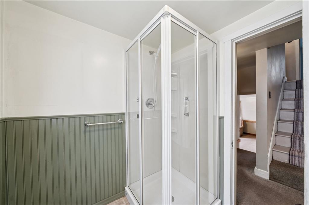 161 Millertown Road Normalville, PA 15469 - Photo 16 of 30 a bathroom with a shower and a glass door