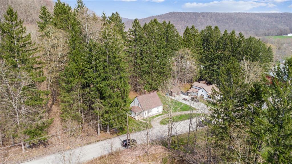 161 Millertown Road Normalville, PA 15469 - Photo 28 of 30 a aerial view of a house with a yard and a large tree