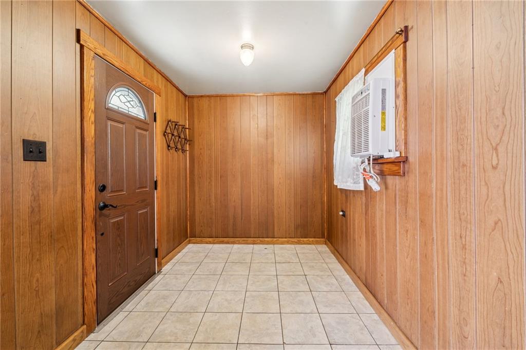 161 Millertown Road Normalville, PA 15469 - Photo 4 of 30 a view of a hallway with wooden shelves
