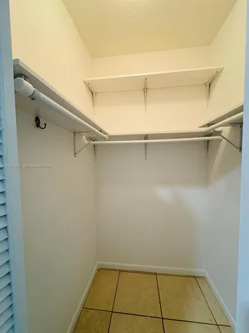 a bathroom with a sink a toilet and a shower