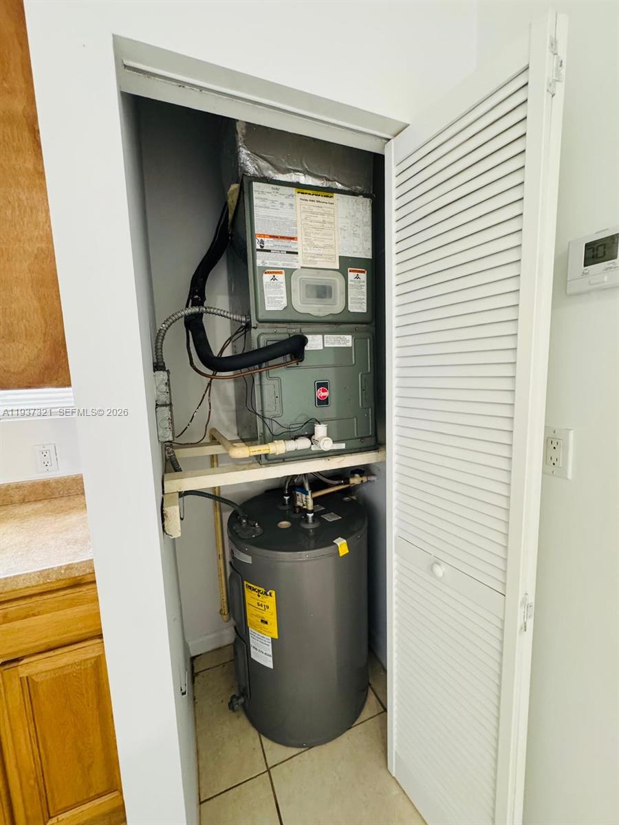 1330 Northwest 5th Street, Unit 1 Miami, FL 33125 - Photo 9 of 15 a utility room with washer and dryer