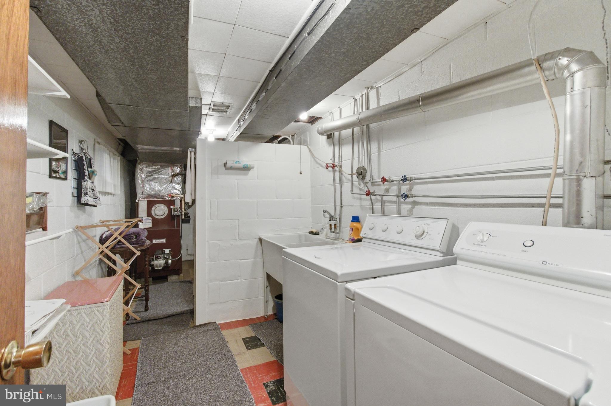 684 Powell Street Hawk Run, PA 16840 - Photo 33 of 35 Laundry shower & utilities located in basement.