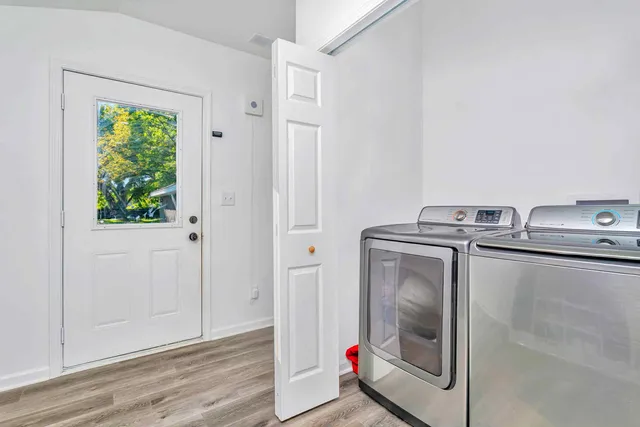 a utility room with dryer and washer