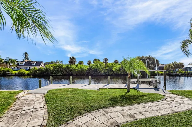 a view of a park with swings and slides