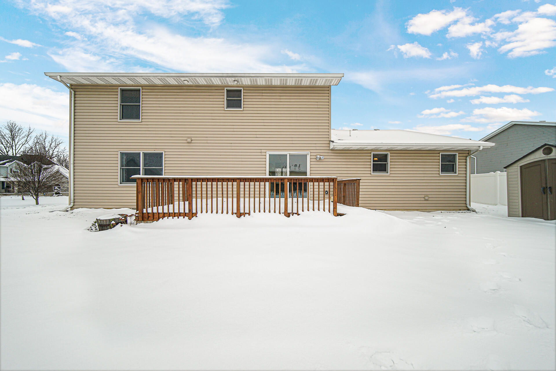 515 Tamarack Trail Hebron, IN 46341 - Photo 29 of 38 a view of a house with a wooden fence