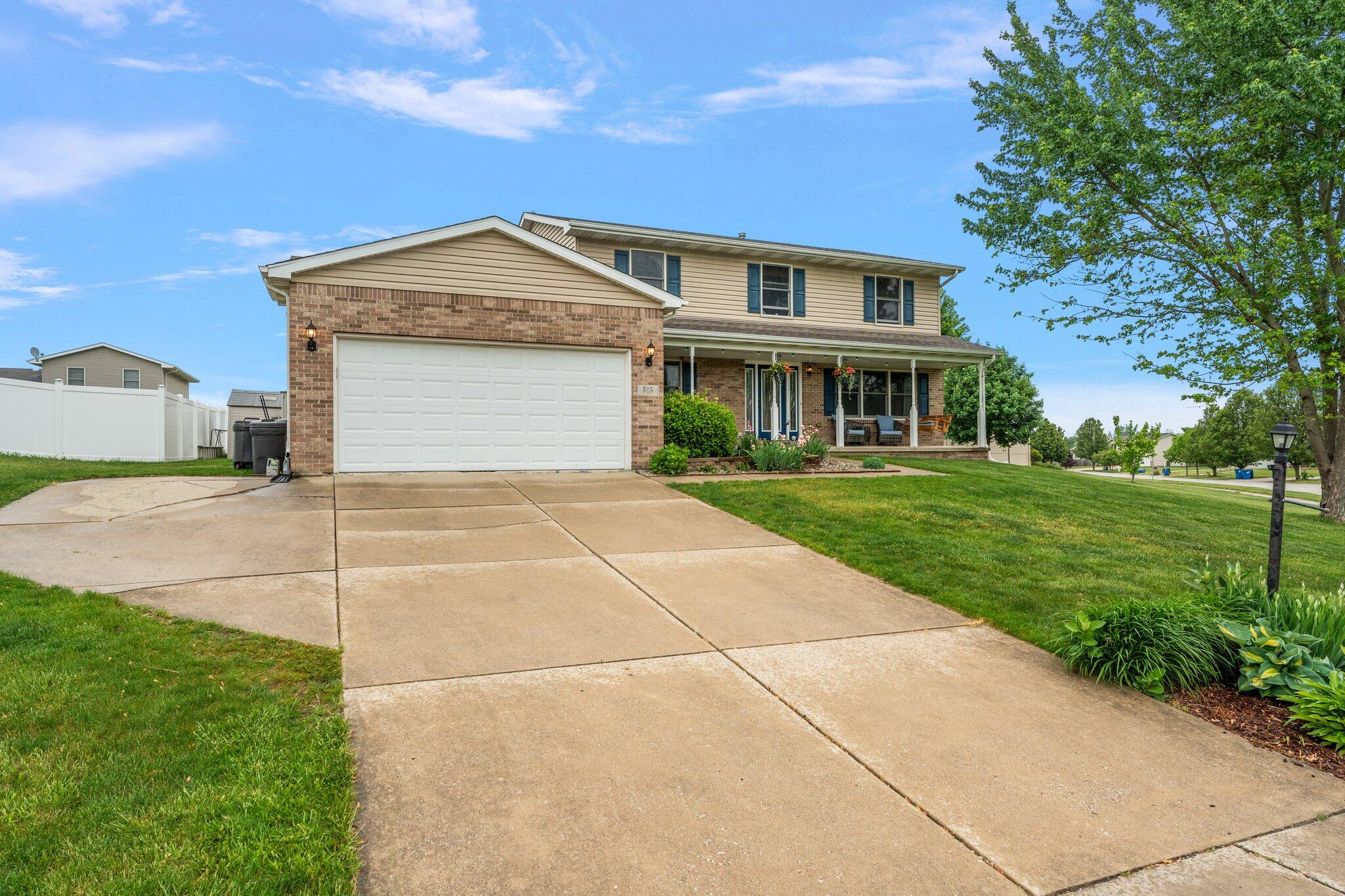 515 Tamarack Trail Hebron, IN 46341 - Photo 33 of 38 a view of a house with a yard and potted plants
