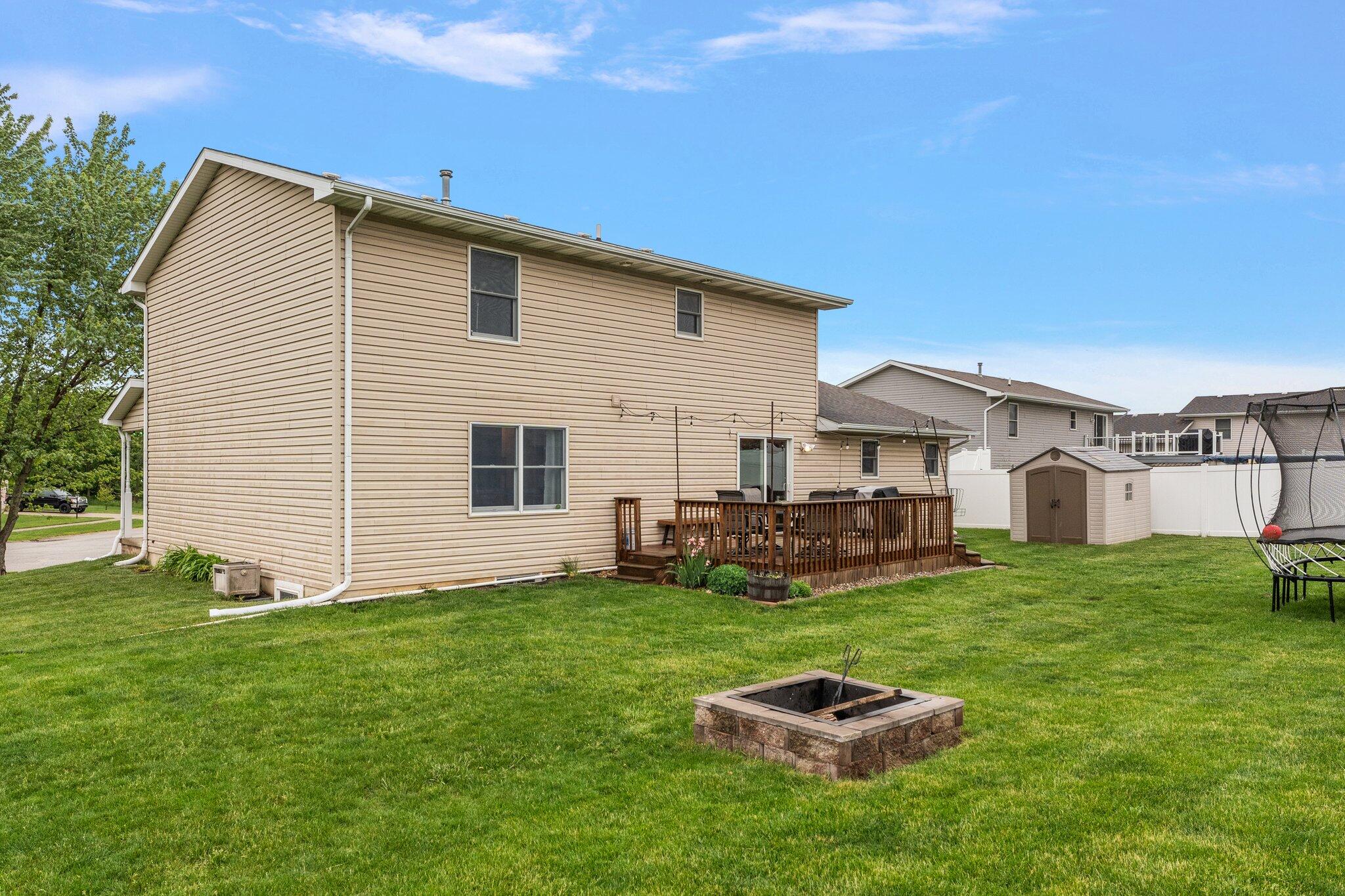 515 Tamarack Trail Hebron, IN 46341 - Photo 36 of 38 a front view of a house with a yard
