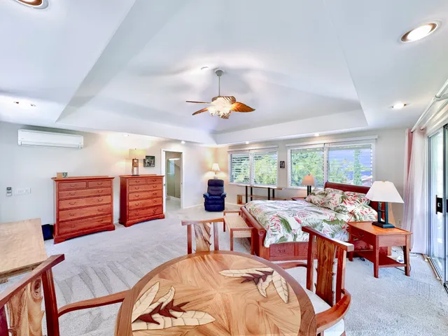 a very nice looking living room with a large window