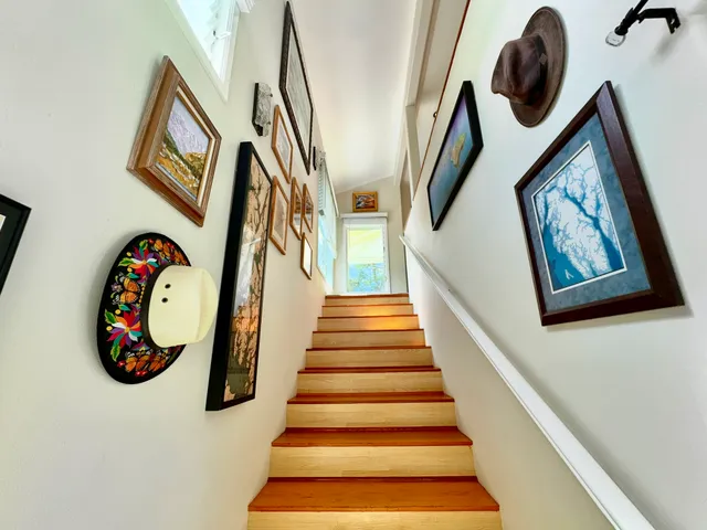 a view of an entryway with wooden floor