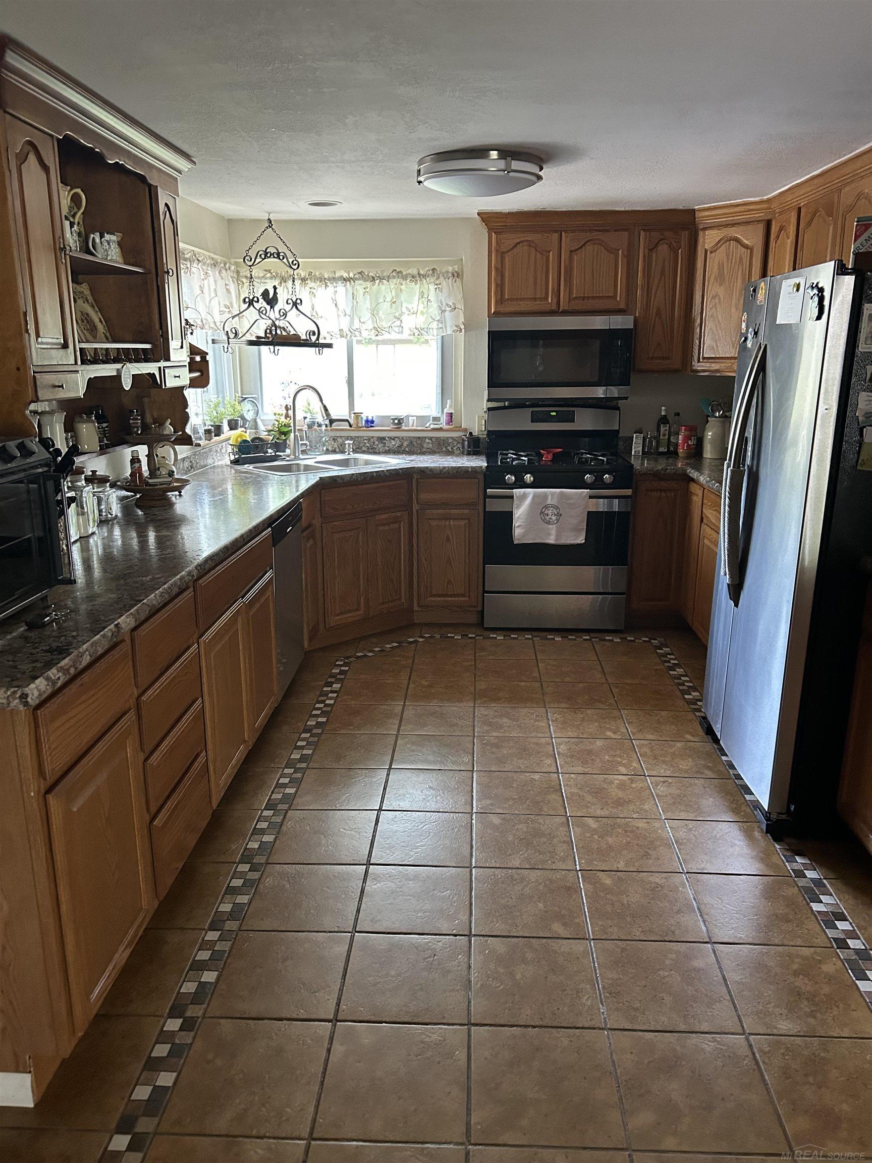 830 West 3rd Street Pinconning, MI 48650 - Photo 12 of 39