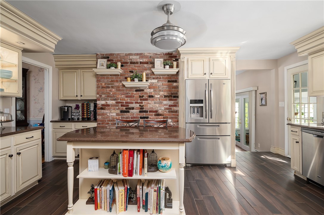 81 Sandy Brook Road Glocester, RI 02857 - Photo 10 of 43 Kitchen with exposed brick, coffee station and cabinets with double drawers and turtle pull-outs