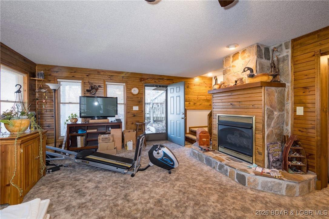 30857 Berry Road Stover, MO 65078 - Photo 30 of 58 Fireplace w/gas logs in Rec Room Lower level