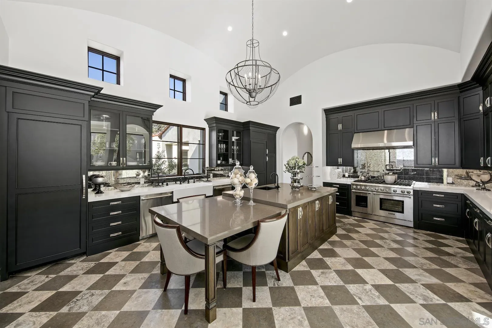 14304 Ridge Ranch Road Valley Center, CA 92082 - Photo 11 of 30 a large kitchen with a dining table and chairs