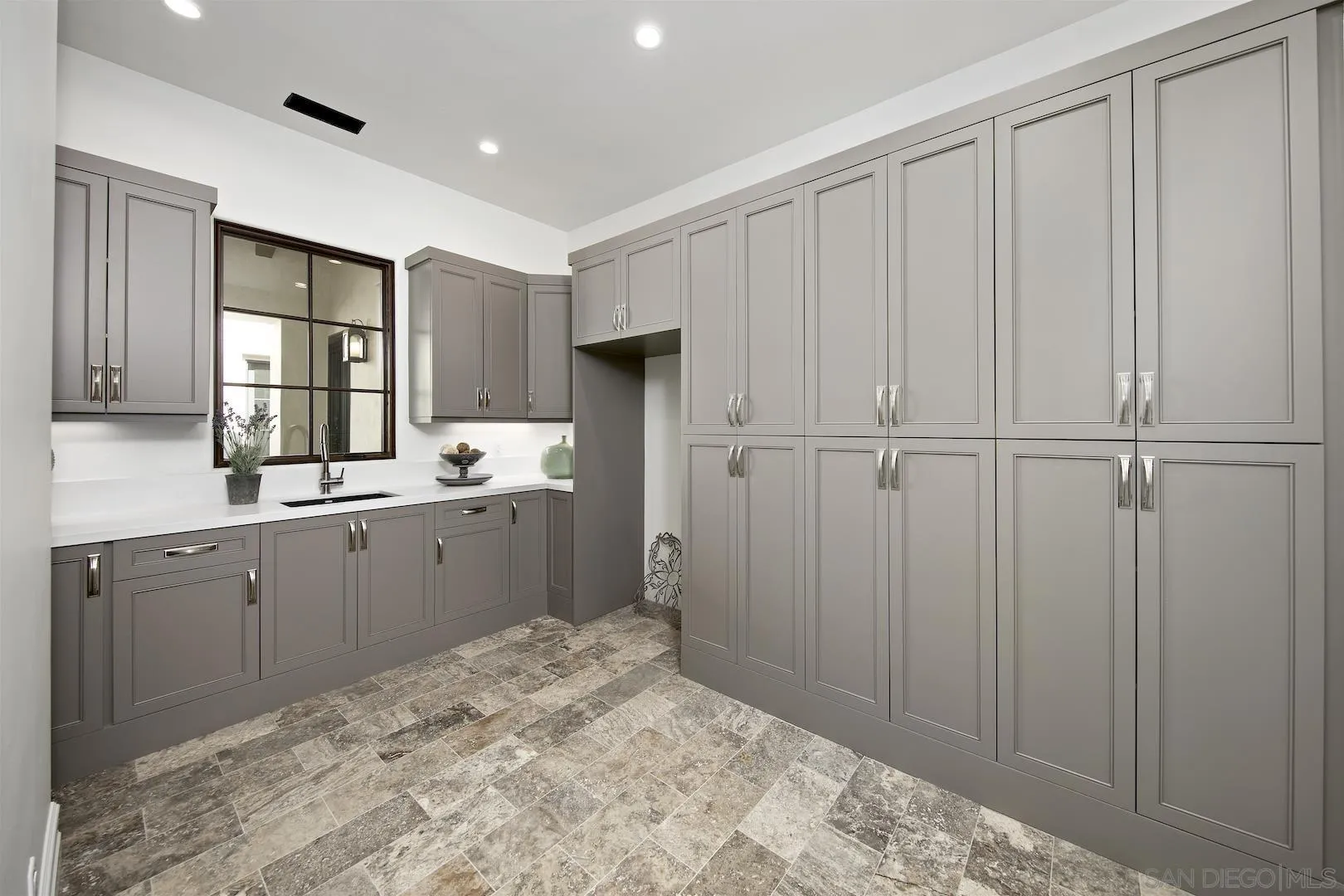 14304 Ridge Ranch Road Valley Center, CA 92082 - Photo 13 of 30 a spacious bathroom with a sink and a mirror
