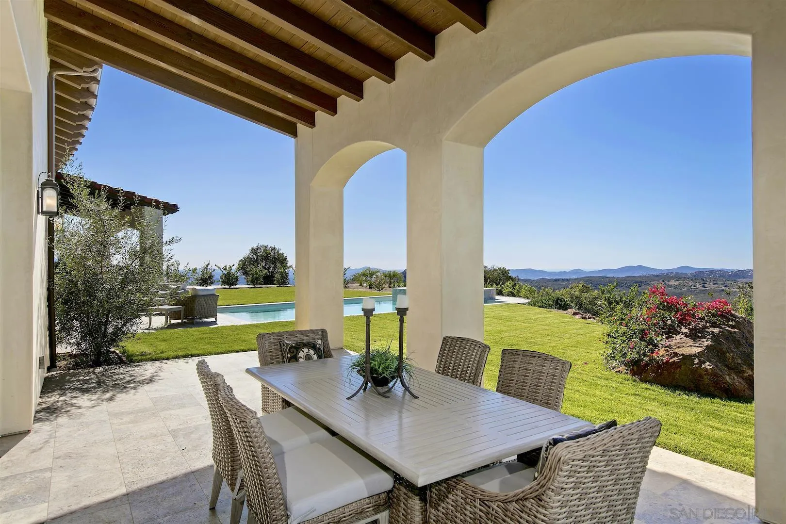 14304 Ridge Ranch Road Valley Center, CA 92082 - Photo 28 of 30 a view of an outdoor dining space with furniture and garden