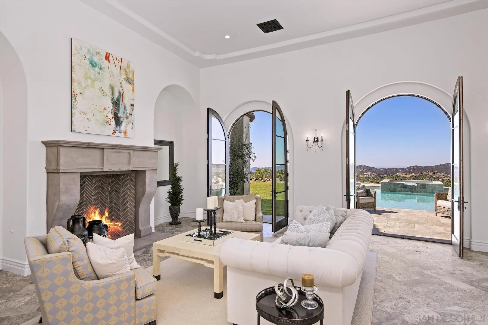 14304 Ridge Ranch Road Valley Center, CA 92082 - Photo 3 of 30 a living room with furniture and a fireplace