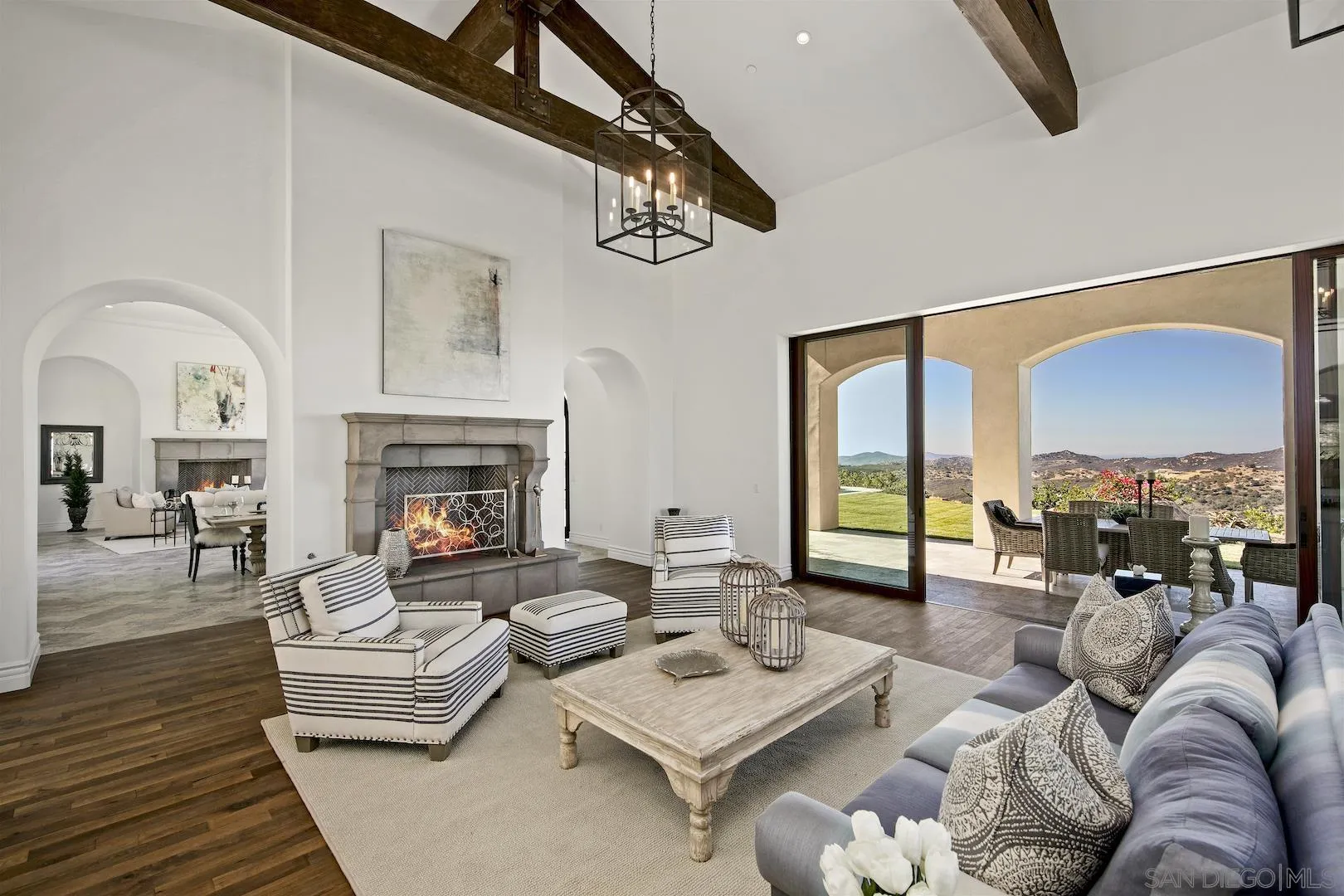 14304 Ridge Ranch Road Valley Center, CA 92082 - Photo 7 of 30 a living room with furniture fireplace and a table