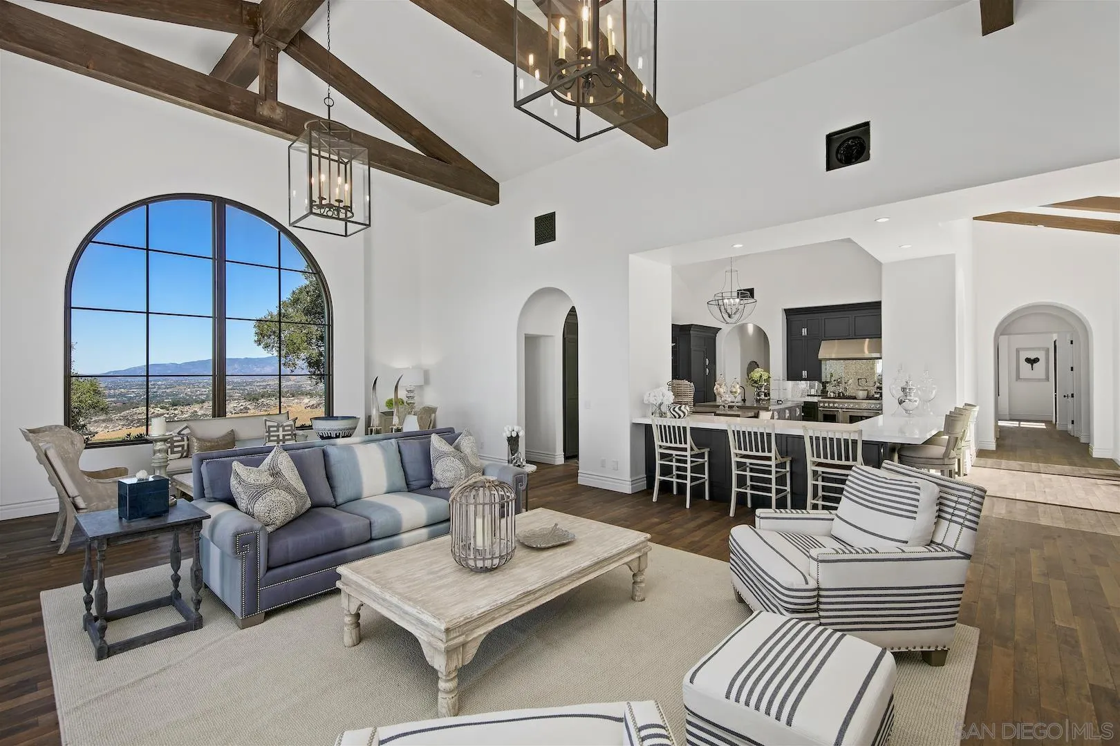 14304 Ridge Ranch Road Valley Center, CA 92082 - Photo 10 of 30 a living room with furniture a rug and white walls