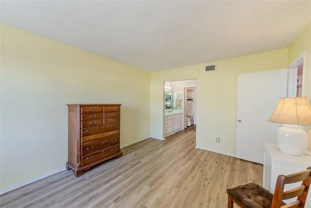 a bathroom with a shower and a bath tub