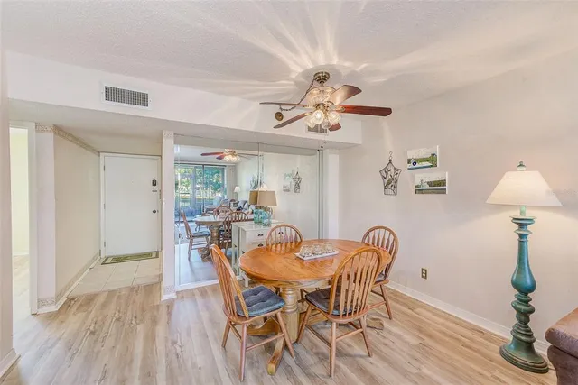 a kitchen with stainless steel appliances a stove a microwave and a refrigerator