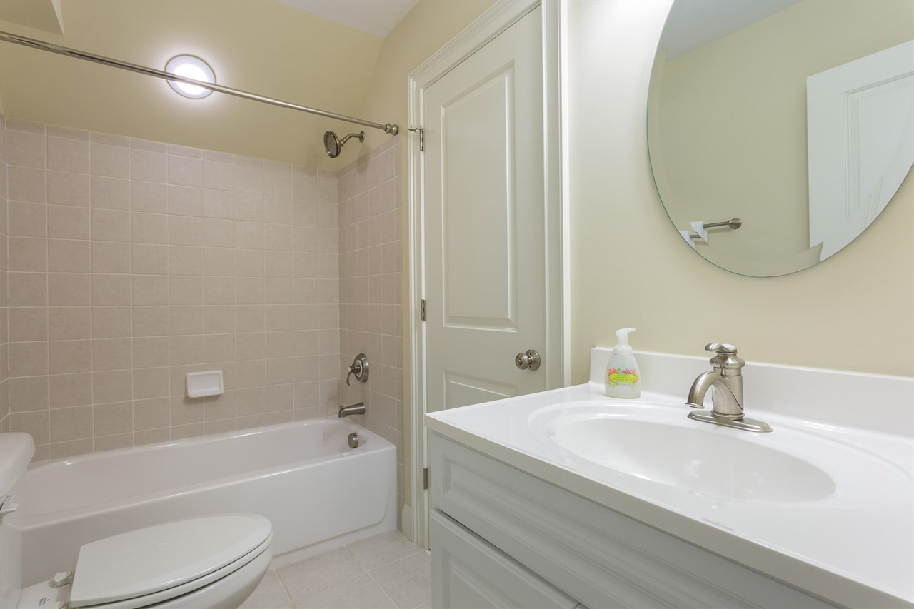 1716 Stannard Trail Raleigh, NC 27612 - Photo 30 of 30 The 3rd floor bath features a tub/shower combination and direct access to both the hallway and the 5th bedroom. 3rd Floor Full Bath
