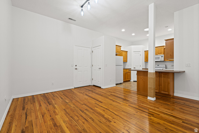 70 North Main Street, Unit 213 Bountiful, UT 84010 - Photo 5 of 15 Spacious living space looking into the kitchen