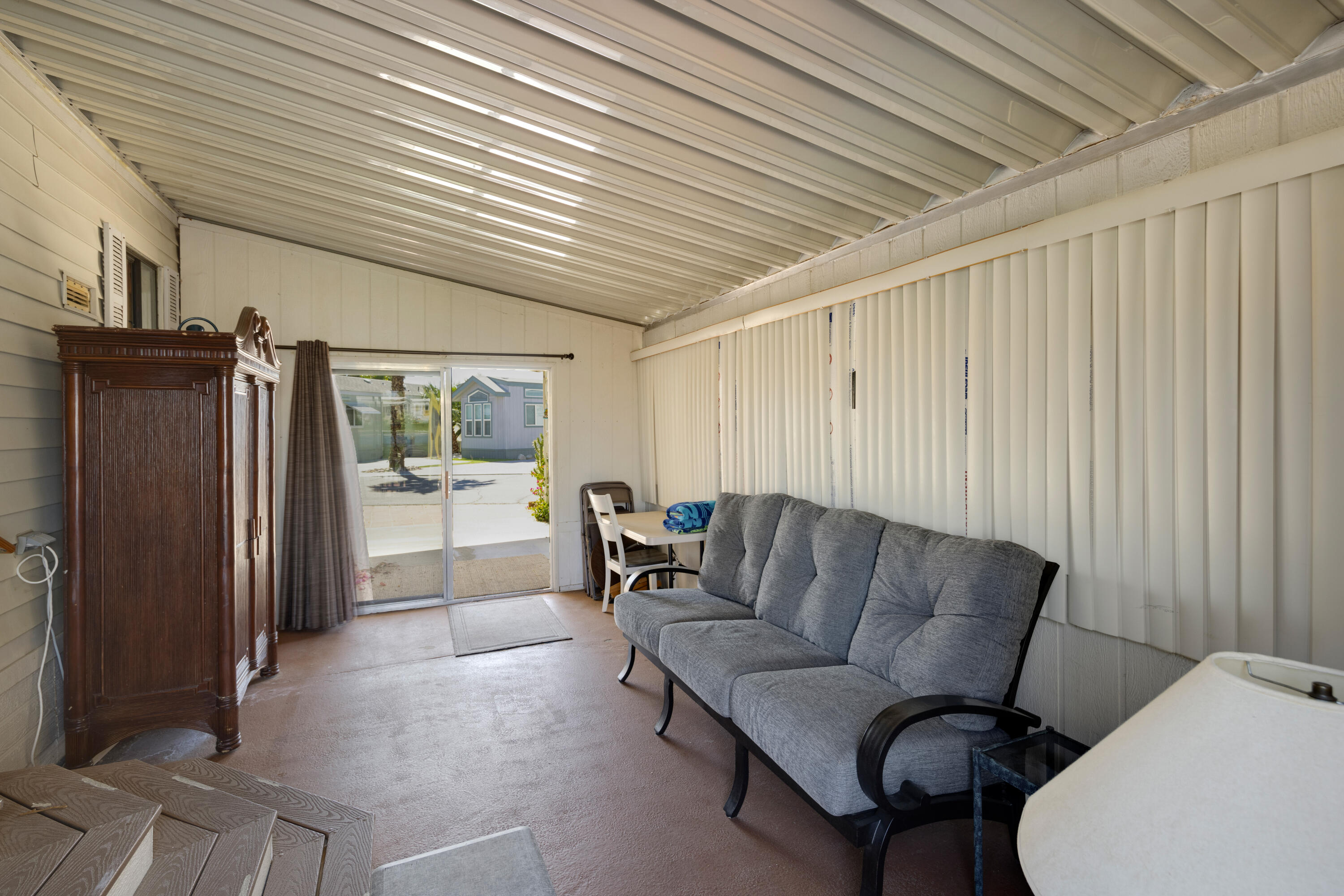 74711 Dillon Road, Unit 123 Sky Valley, CA 92241 - Photo 12 of 23 a living room with furniture and a walk in closet