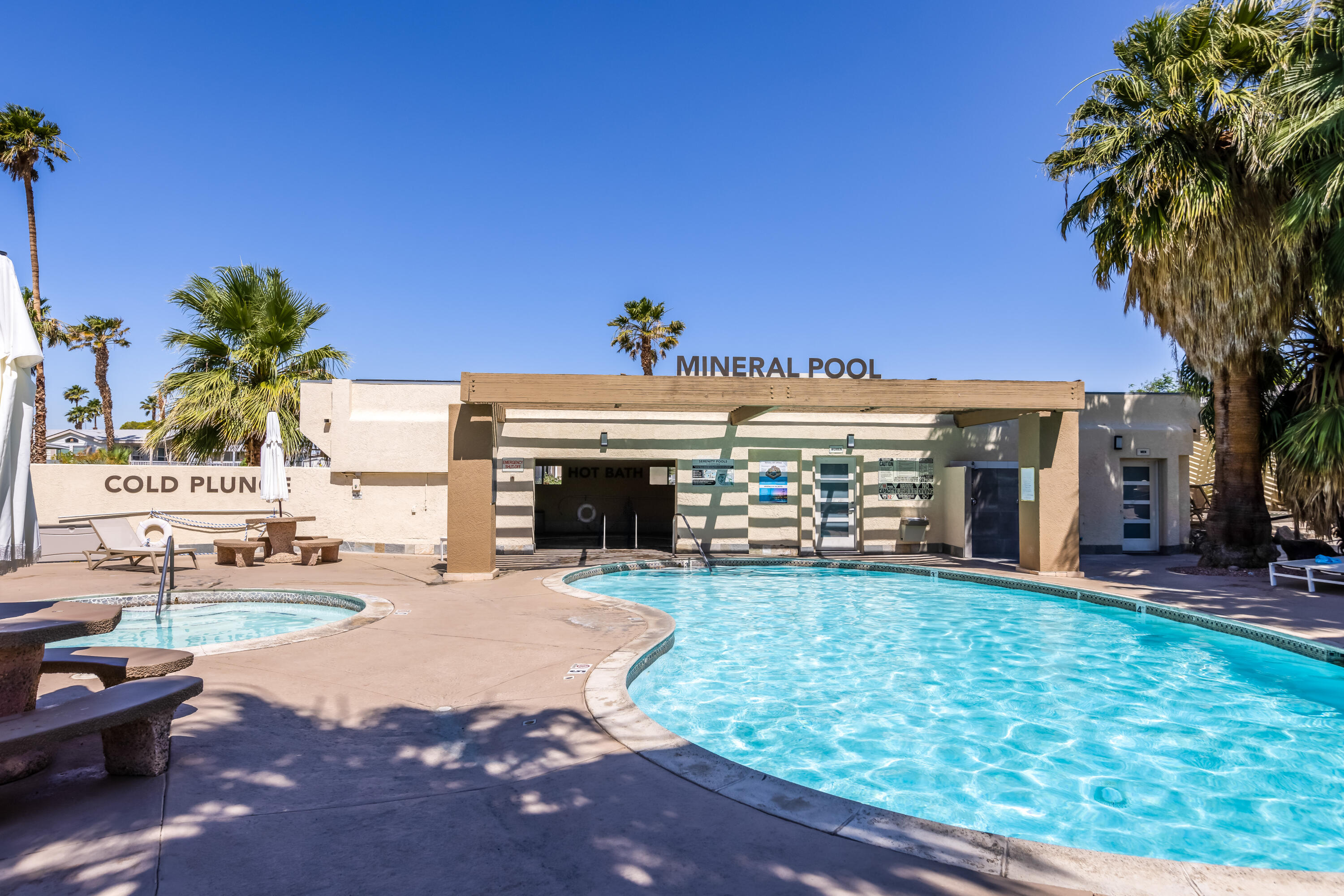 74711 Dillon Road, Unit 123 Sky Valley, CA 92241 - Photo 21 of 23 a view of a house with garden and a yard