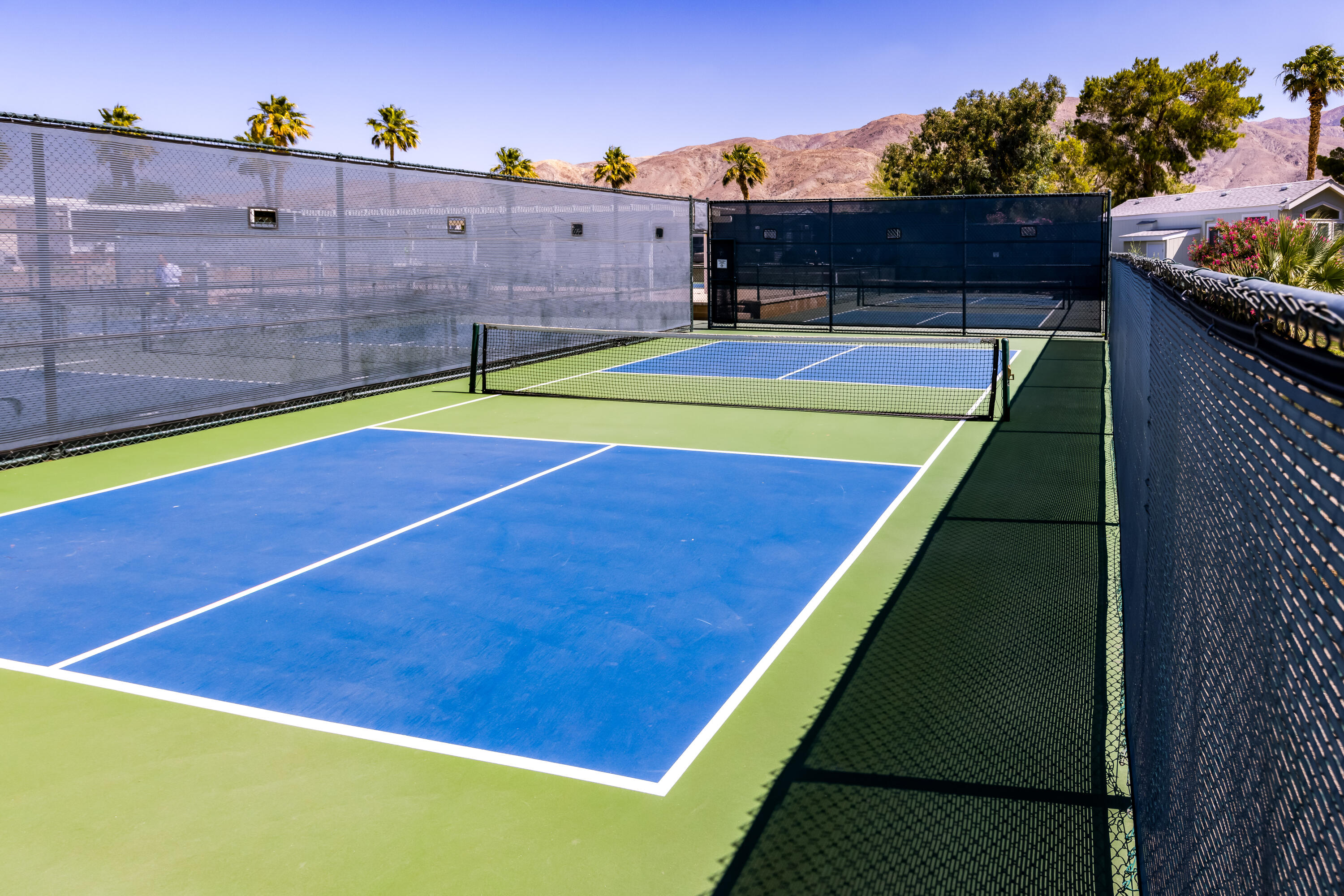 74711 Dillon Road, Unit 123 Sky Valley, CA 92241 - Photo 23 of 23 a view of a tennis court
