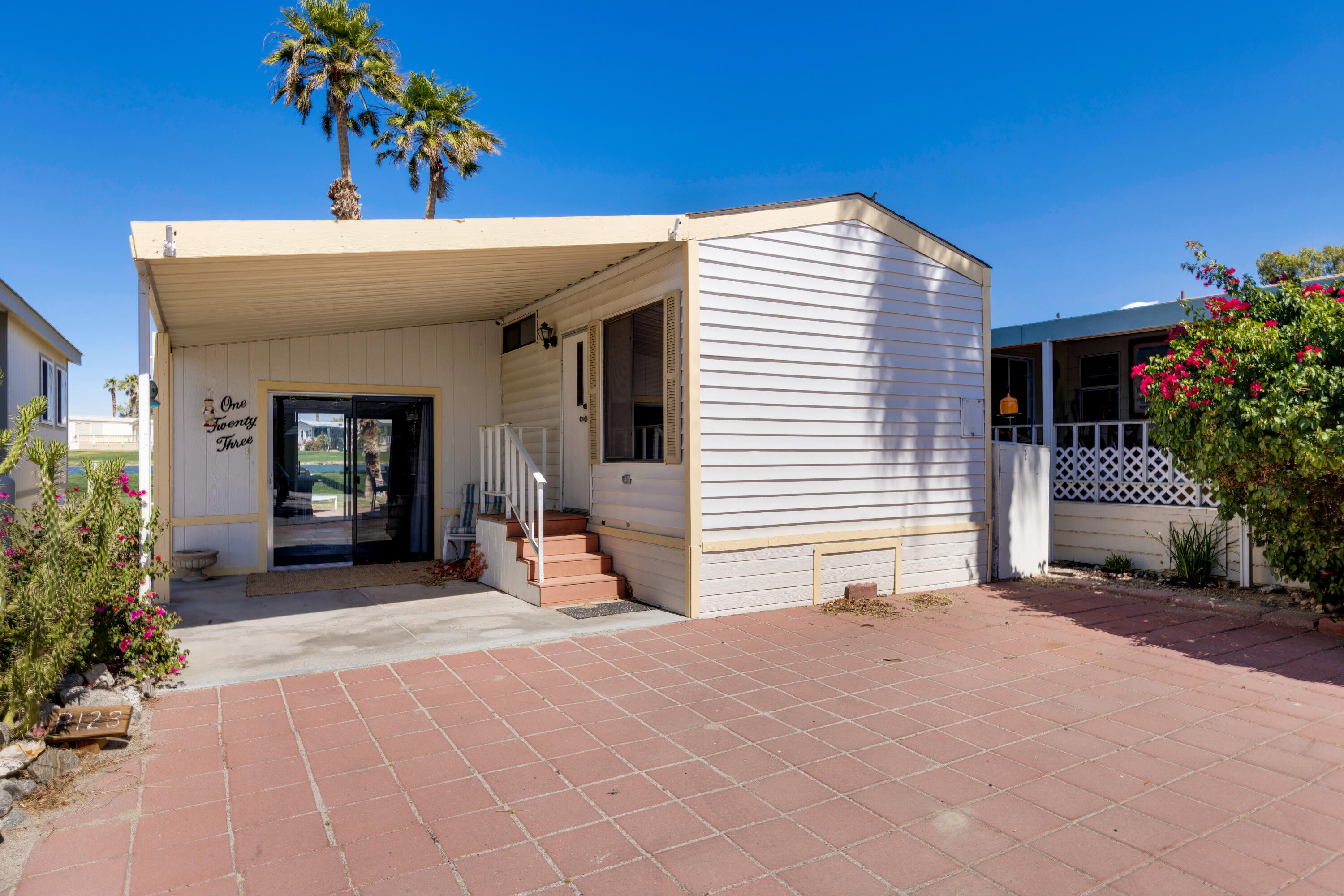 74711 Dillon Road, Unit 123 Sky Valley, CA 92241 - Photo 3 of 23 a view of a house with a patio