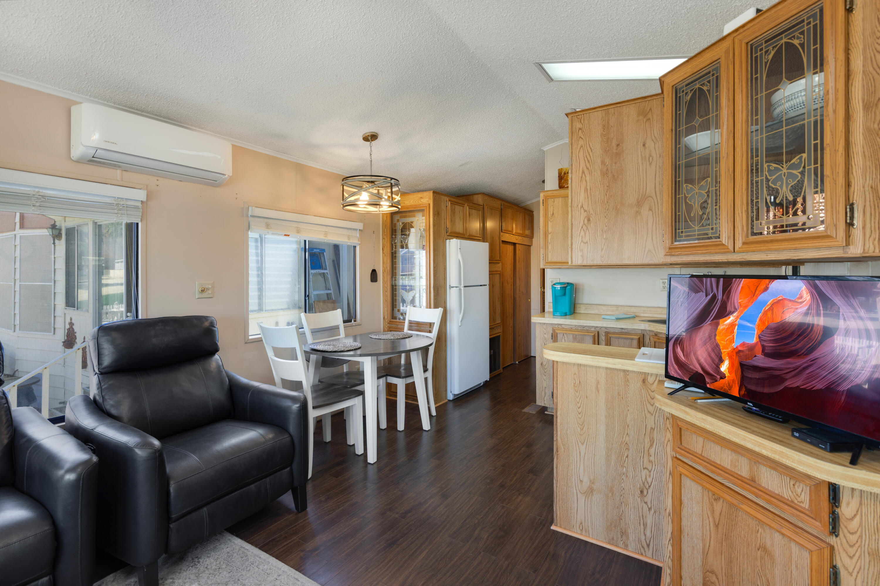 74711 Dillon Road, Unit 123 Sky Valley, CA 92241 - Photo 6 of 23 a living room with furniture and a table