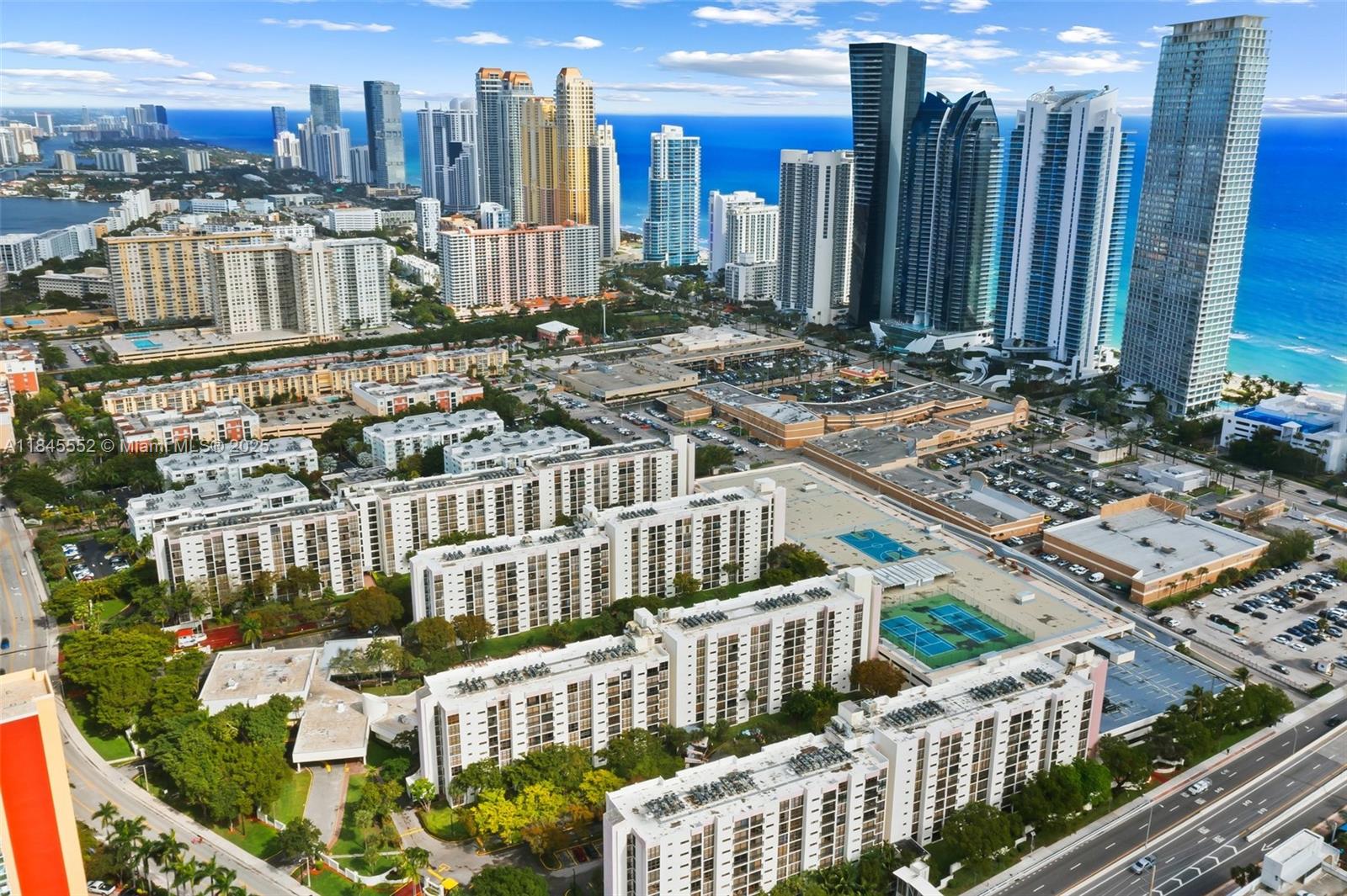 16919 North Bay Road, Unit 115 Sunny Isles Beach, FL 33160 - Photo 19 of 20 a view of a city with tall buildings