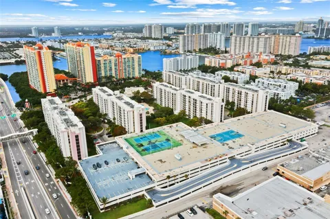a view of a kitchen with microwave and cabinets