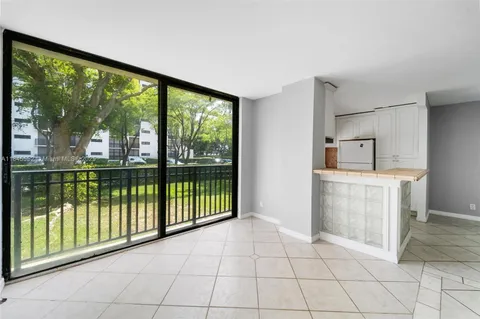 a view of a room with sliding glass door