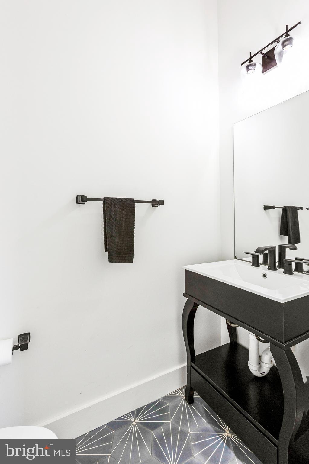 1922 1st Street Northwest, Unit B Washington, DC 20001 - Photo 11 of 49 Sleek modern bathroom with stylish accents.