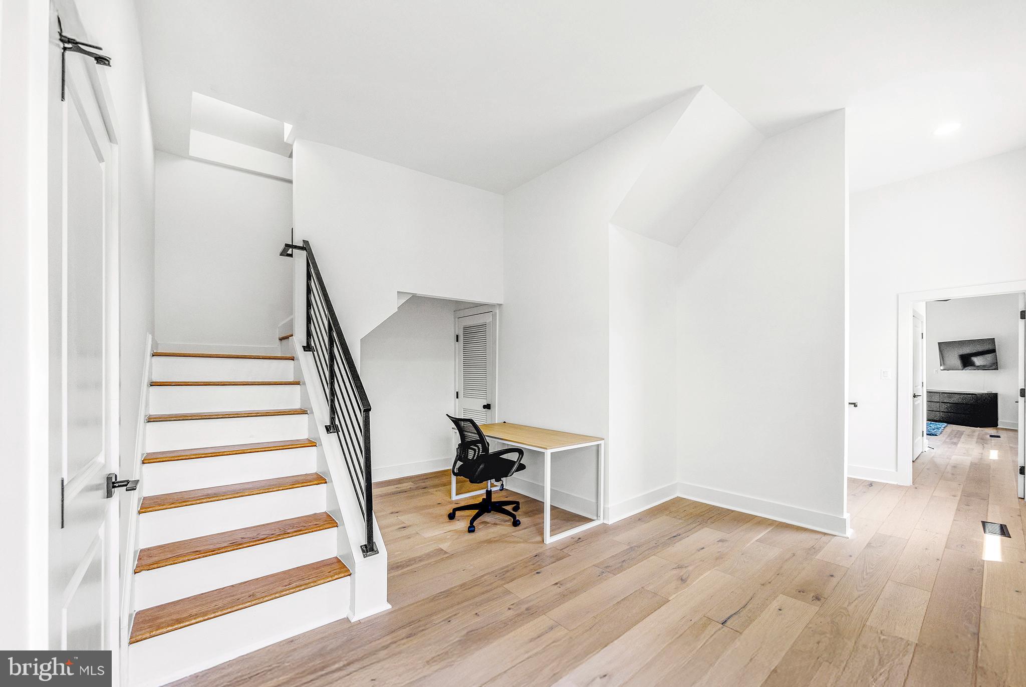 1922 1st Street Northwest, Unit B Washington, DC 20001 - Photo 23 of 49 Bright, airy space with modern staircase.