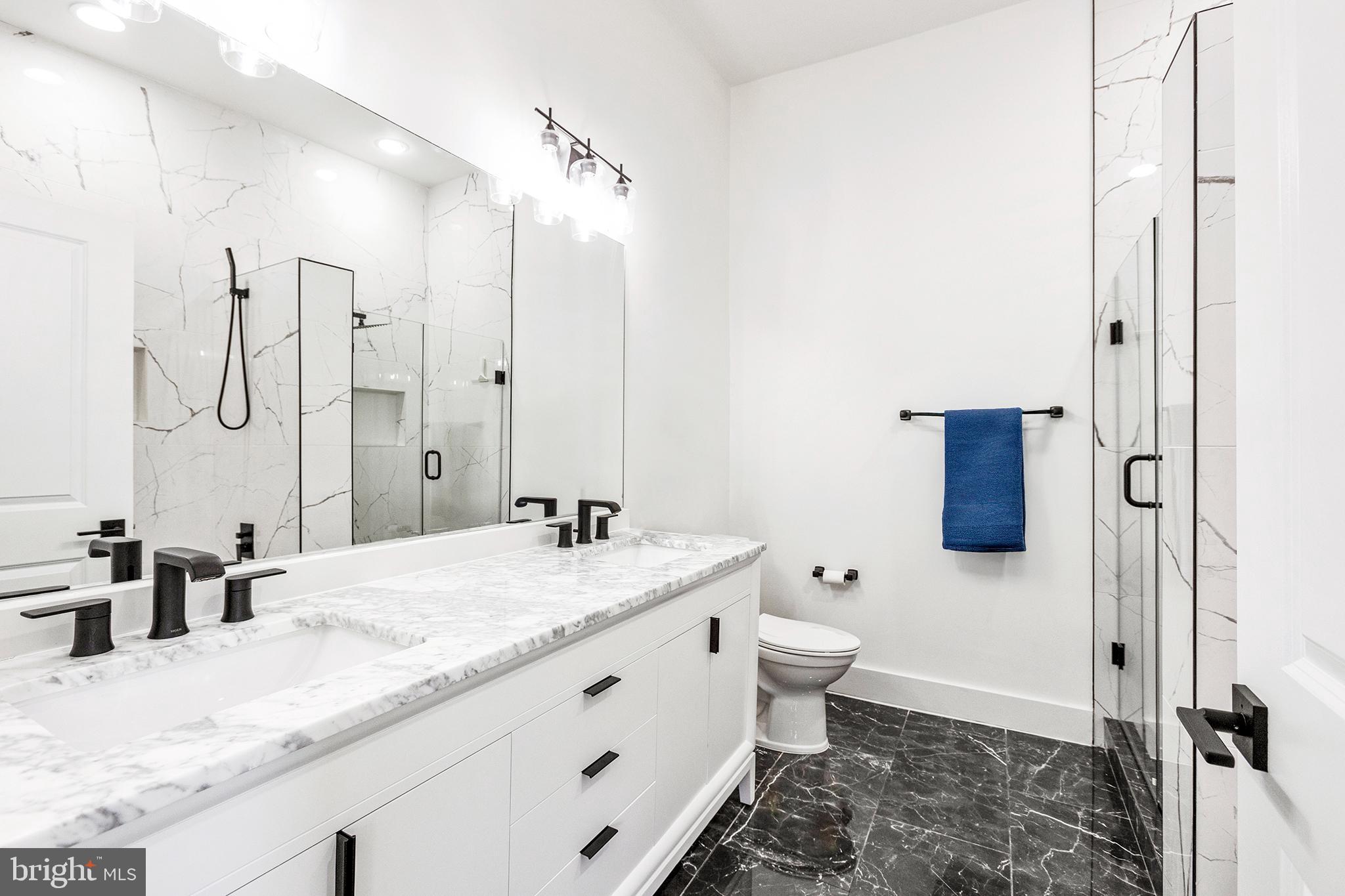 1922 1st Street Northwest, Unit B Washington, DC 20001 - Photo 25 of 49 Sleek modern bathroom with elegant finishes.