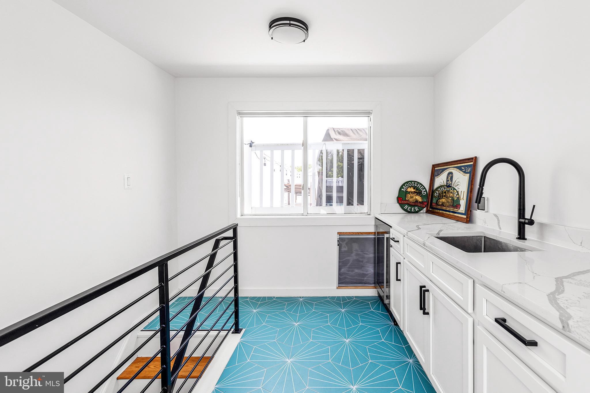 1922 1st Street Northwest, Unit B Washington, DC 20001 - Photo 37 of 49 Bright and modern space with vibrant flooring.